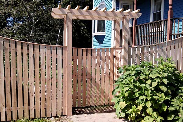 Cedar Board Fence with thin cap & pergola in Stoneham MA